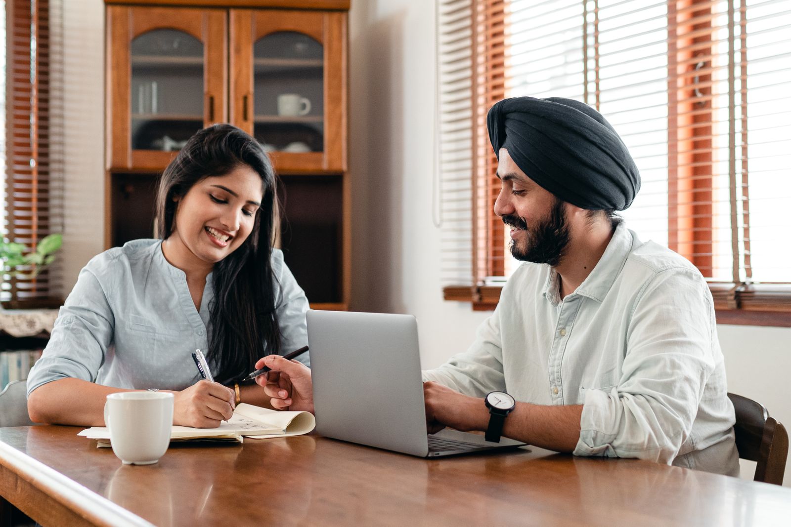 Professionals reviewing business information together